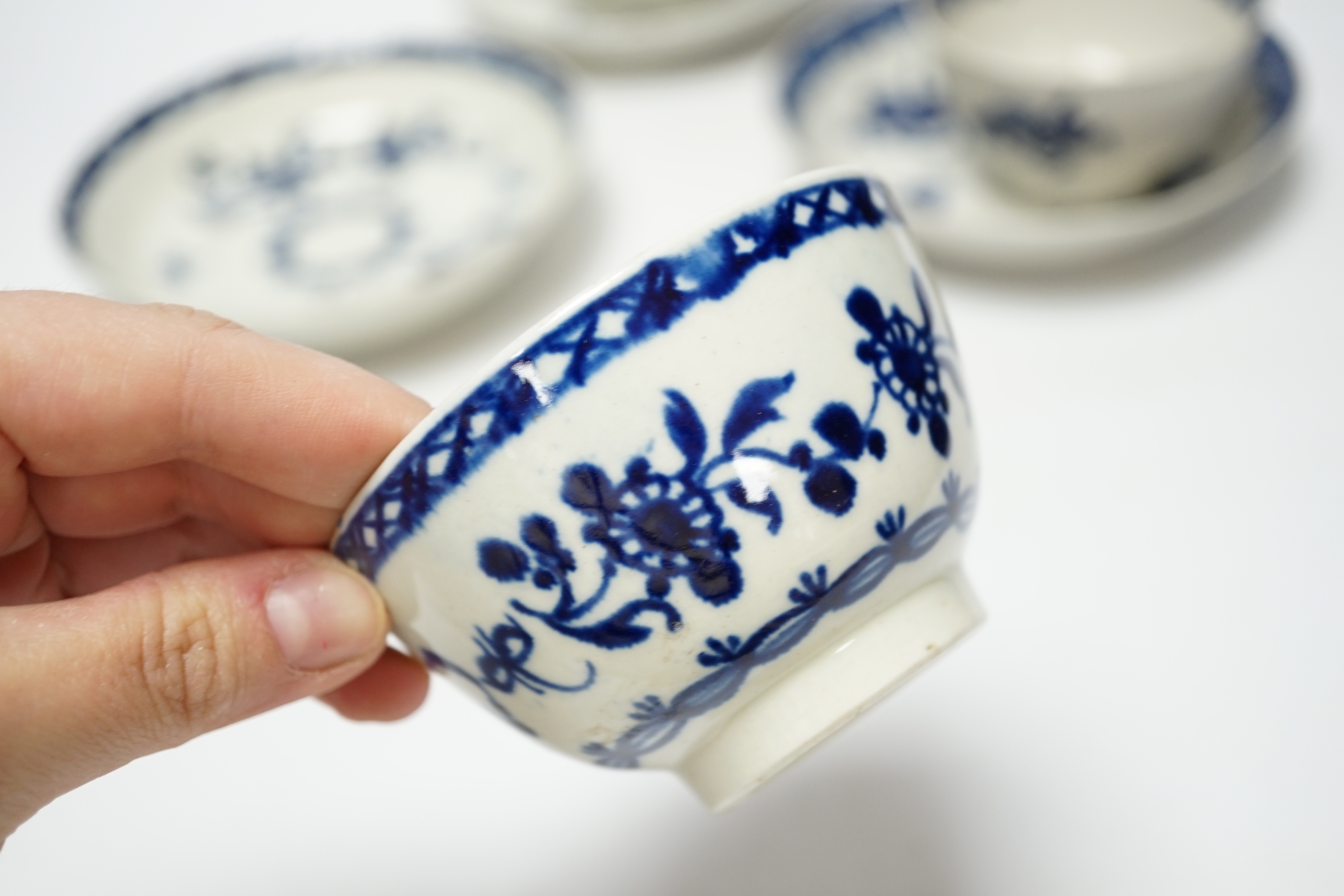 Three late 18th century Liverpool blue and white teabowls and saucers
